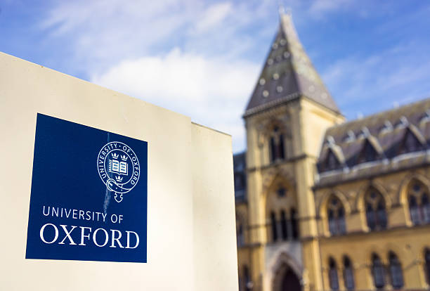 University of Oxford Oxford, UK - March 6, 2015: The University of Oxford insignia on a sign outside the Pitt Rivers Museum, which houses the university's anthropological and archaeological collections. oxford university stock pictures, royalty-free photos & images