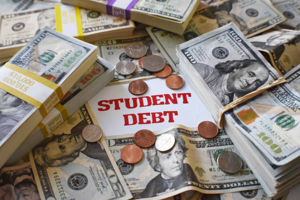 University Student Loan Debt With Borrowed Money High Quality University Student Loan Debt With Borrowed Money student debt stock pictures, royalty-free photos & images
