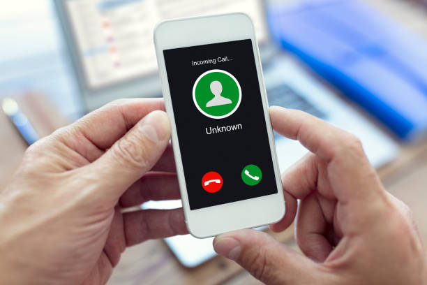 Unknown number or caller ID on mobile phone stock photo