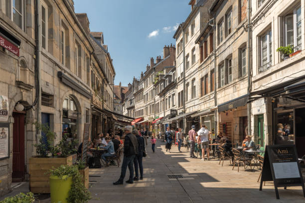 unknown people in historic old town of Besancon, Franche-Comte, France stock photo