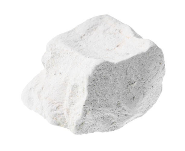 unpolished chalk (white limestone) rock cutout unpolished chalk (white limestone) rock cutout on white background chalk rock stock pictures, royalty-free photos & images