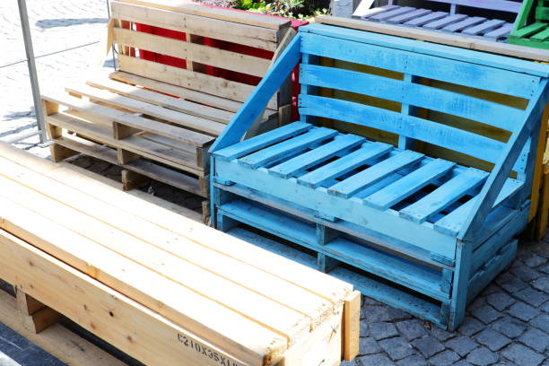 Unusual bench done with recycled wooden pallets stock photo