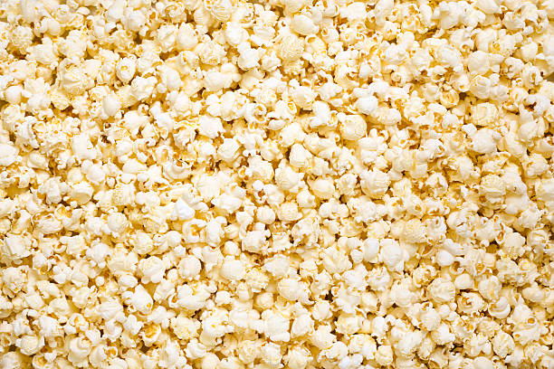 Upper view of butter flavor popcorn stock photo