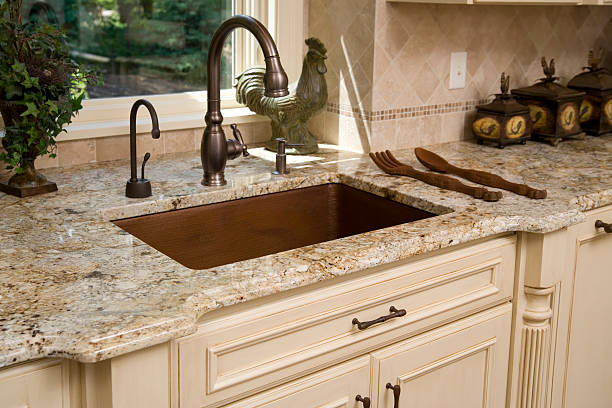 Upscale kitchen sink and countertop. stock photo
