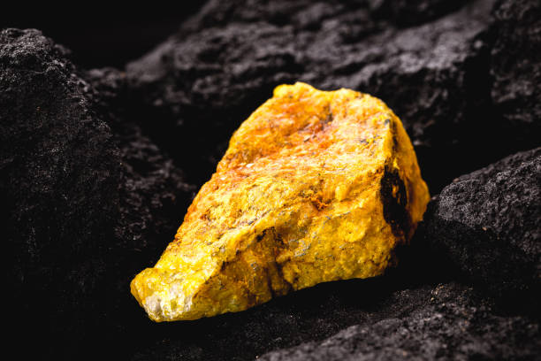 uranium ore in mine, mineral radiation concept, radioactive energy stock photo