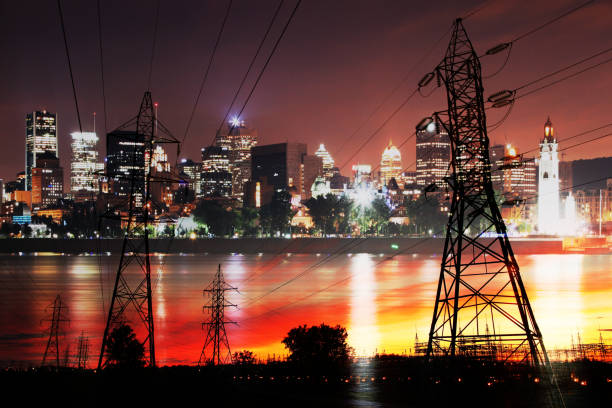 Urban Electric Grid Photo montage of two electric pylon silhouettes with Montreal City in background buzbuzzer montreal city stock pictures, royalty-free photos & images