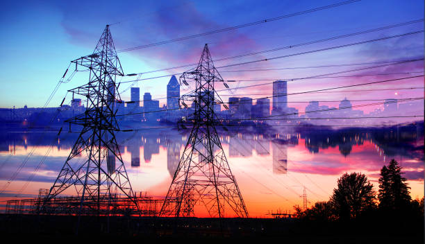 Urban Electricity Supply Photo montage of two electric pylon silhouettes with Montreal City in background buzbuzzer montreal city stock pictures, royalty-free photos & images