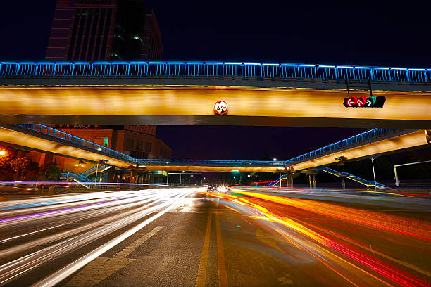 Urban footbridge and road intersection of night scene stock photo