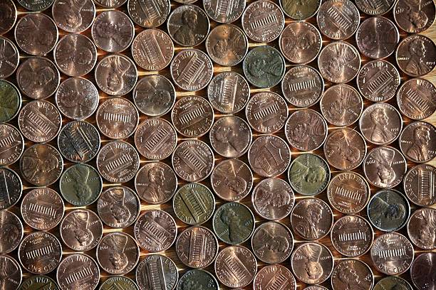 US-cent coins, arranged in rows, US penny, background, texture. stock photo