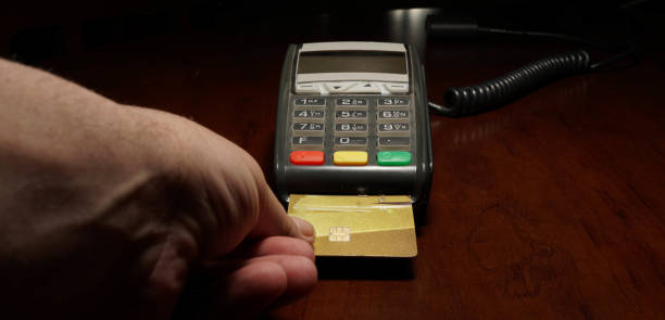 use of credit card and pos machine stock photo