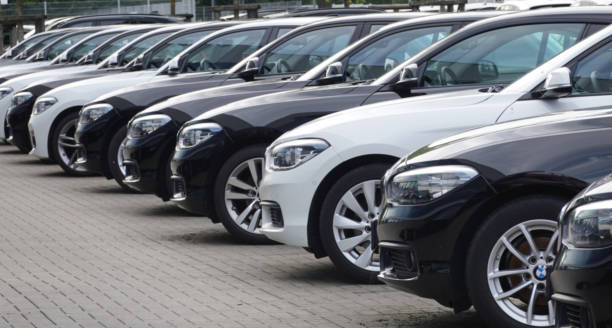 Used BMW cars parked at a public car dealership in Hamburg, Germany stock photo