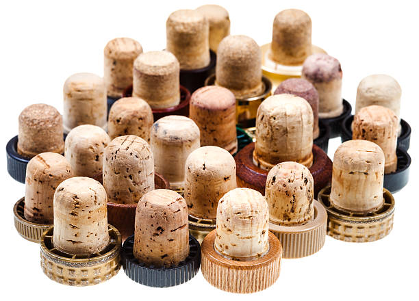 used corks from strong drinks used corks from strong drinks isolated on white background cork stopper stock pictures, royalty-free photos & images