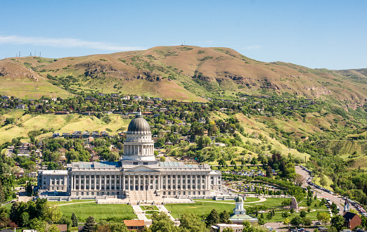 An elevated view of Utah's State Capitol building in springtime, located to the north of Salt Lake City center.