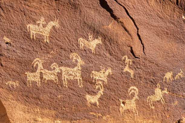 Ute Petroglyphs, Delicate arch hiking trail, Arches National Park, adjacent to the Colorado River, Moab, Utah, USA stock photo