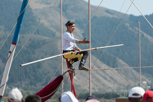 Isyk-Kul, Kyrgyzstan - September ‎29, ‎2018: Uzbek tightrope walker in World Nomad Games
