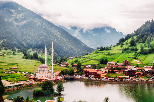 Uzungol in Trabzon, Turkey Uzungol is a lake situated to the south of the city of Trabzon. The area is most famous for its natural beauty and located in a valley between high rising mountains. local landmark stock pictures, royalty-free photos & images