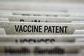 istock Vaccine patent file folder 1291374226