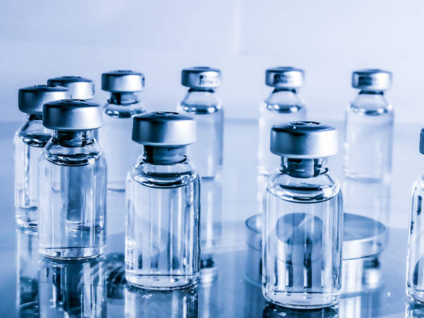 Vaccine Production Vaccine Production Serie ampoule stock pictures, royalty-free photos & images