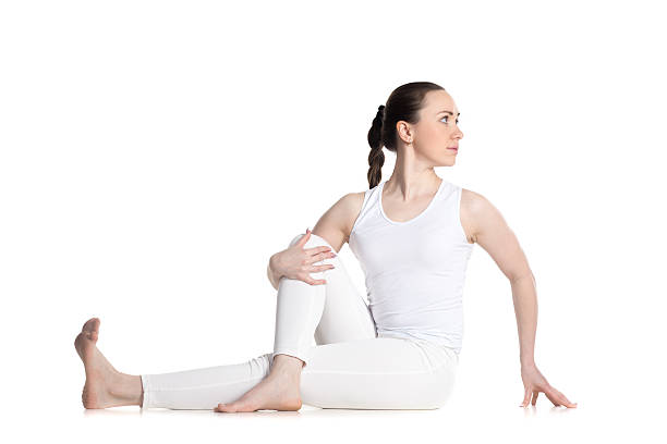 The half spinal twist yoga pose to beat alcohol addiction