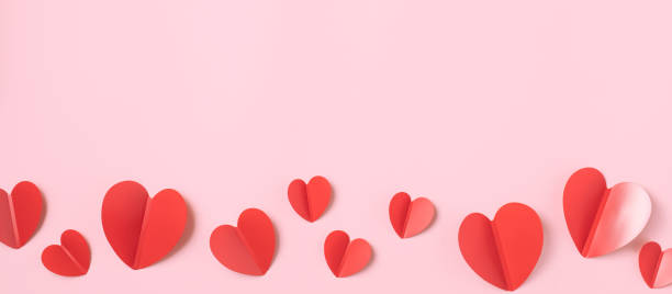 Valentine day composition with red hearts on pink background. stock photo