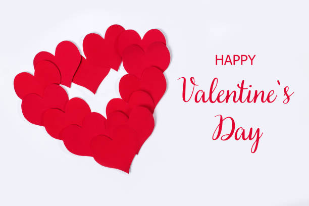 Valentine's day background with red paper hearts lined in heart shape and text happy valentines day. Valentine's day background with red paper hearts lined in heart shape and text happy valentines day happy valentines day stock pictures, royalty-free photos & images
