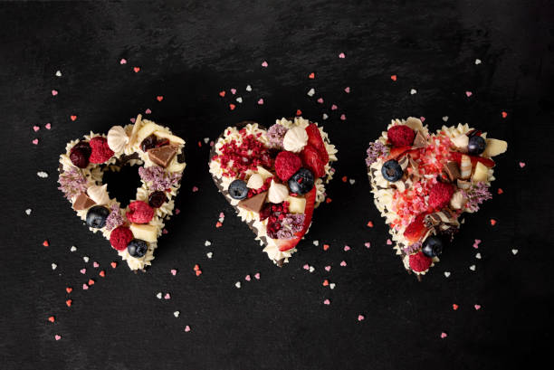 Valentine's Day Cake in heart shape. Sweet romantic dessert. stock photo