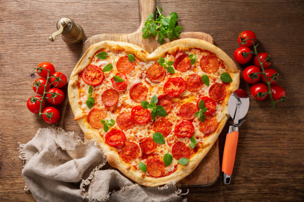 Heart Shaped Pizza Stock Photos, Pictures & Royalty-Free Images - iStock