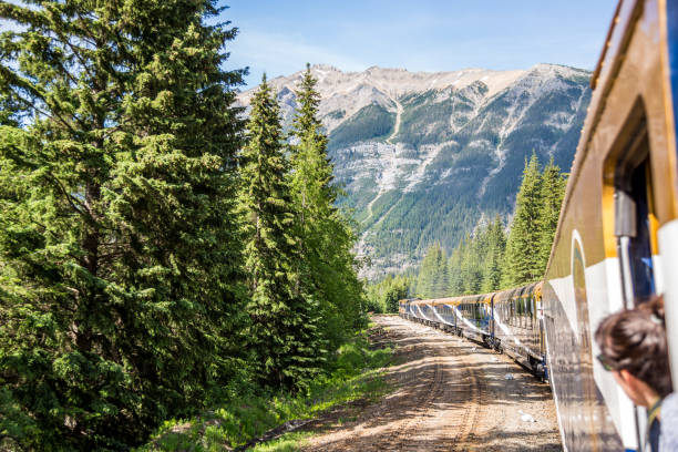 Vancouver, British Columbia / Canada - 06/17/2015 Rocky Mountaineer train traveling through the Rocky Mountains with luxury dining on board. stock photo