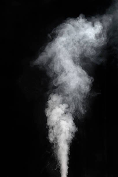 Vaping smoke on black background stock photo