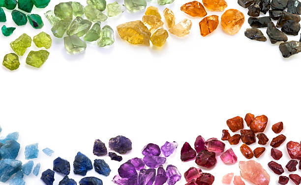 variety of natural colorful gems. horizontal composition. - edelsteen stockfoto's en -beelden