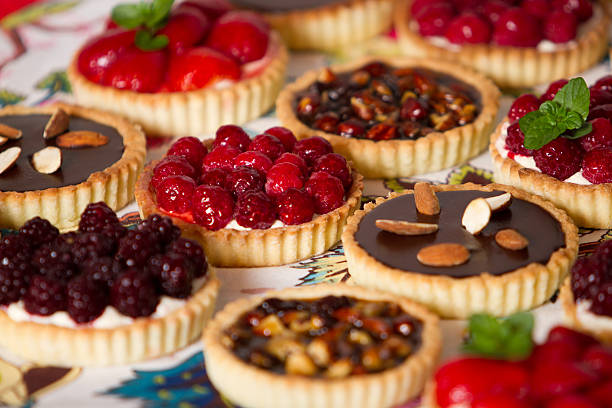 Variety of pies and pastries Delicious french pastries and cakes tart dessert stock pictures, royalty-free photos & images