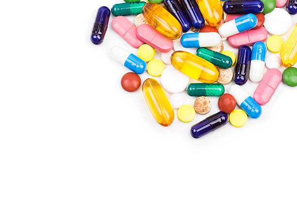 Various color pills and capsules close shot stock photo