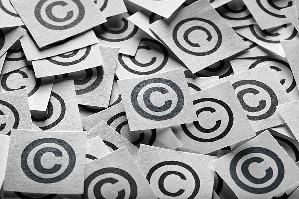 Various copyright sign on a square paper stock photo