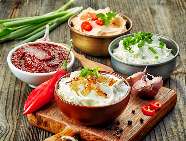 various dip sauces various dip sauces on wooden table cream dairy product stock pictures, royalty-free photos & images