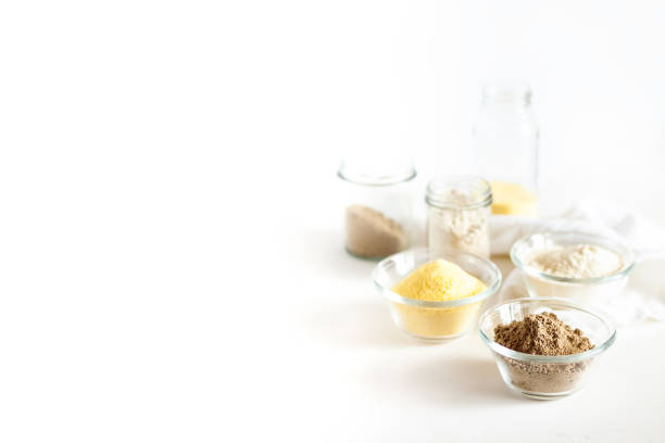 Various gluten free flour corn,sesame,oat,coconut in glass bowl on white background Various gluten free flour corn,sesame,oat,coconut in glass bowl on white background. Alternative to wheat flour for keto paleo diet. Healthy eating,food concept. Copy space,horizontal orientation pea protein powder stock pictures, royalty-free photos & images