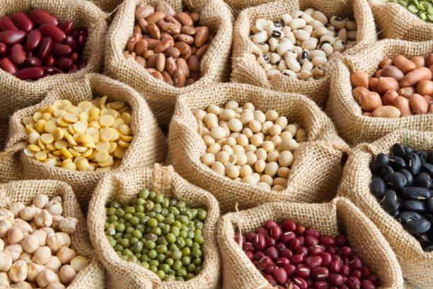 various of legumes in sack bag various of legumes in sack bag. organic food and creation of natural product concept. protein stock pictures, royalty-free photos & images