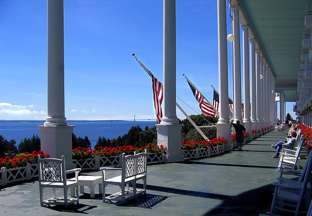 Vast front porch of the Grand Hotel World's longest porch at the century old Grand Hotel on Mackinac Island, Micihigan mackinac island stock pictures, royalty-free photos & images