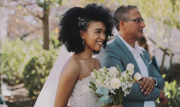 I've never been happier Cropped shot of an attractive young bride walking down the isle with her father on her wedding day fiancé stock pictures, royalty-free photos & images