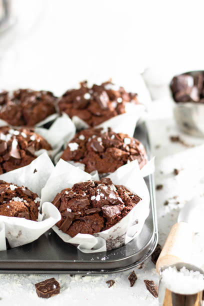 Vegan Chocolate Chip Muffins in baking tray, cropped stock photo