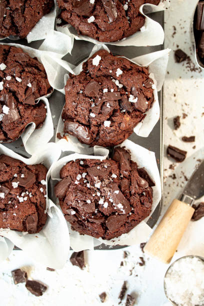 6 Vegan Chocolate Chip Muffins in baking tray stock photo