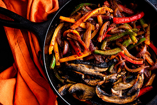 Charred bell peppers, red onion, and portobello mushrooms mixed with spices