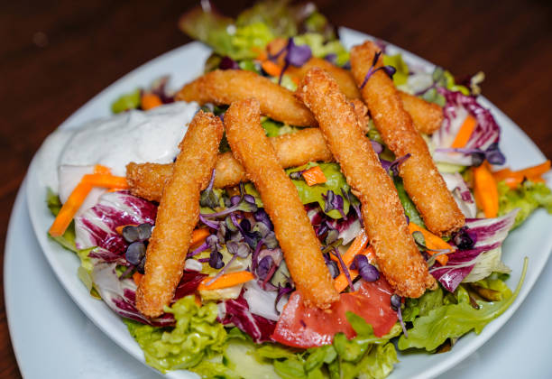 Vegan Food - Potato Sticks with Salad stock photo