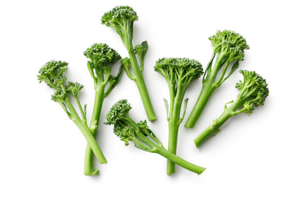 Vegetables: Broccolini Isolated on White Background  broccoli rabe stock pictures, royalty-free photos & images