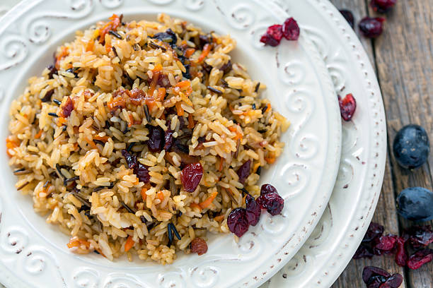 Vegetarian pilaf from a mixture of wild and white rice. stock photo