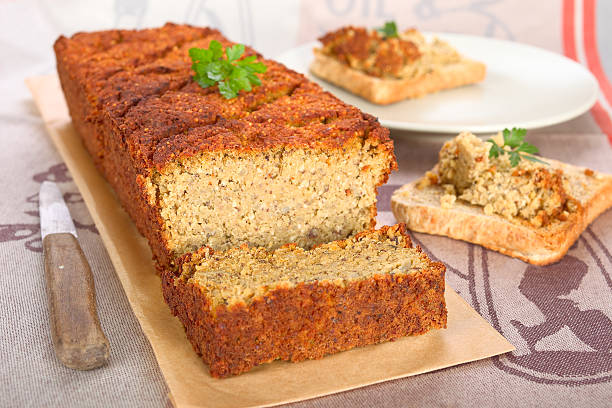 Veggie meatloaf Vegetarian meat loaf with lentils, nuts and quinoa. meat loaf stock pictures, royalty-free photos & images