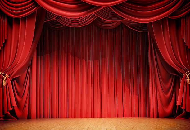 velvet curtains and wooden stage floor stock photo