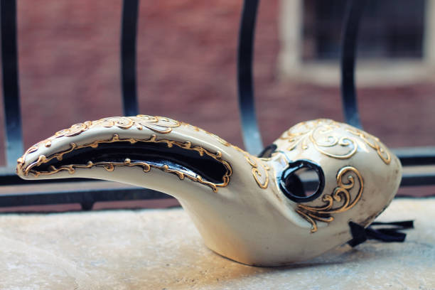 Venetian handmade plague doctor mask. A Venetian handmade plague doctor mask close up. bubonic plague photos stock pictures, royalty-free photos & images