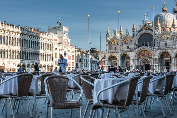 Venice Italy - San Marco square and the famous Florian Cafe stock photo