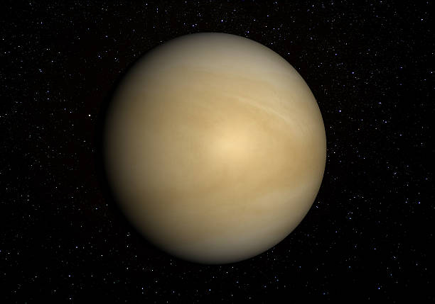 Venus with stars in the background. This image shows the visible yellow cloud tops of Venus, rather than the solid surface revealed by radar. venus planet stock pictures, royalty-free photos & images