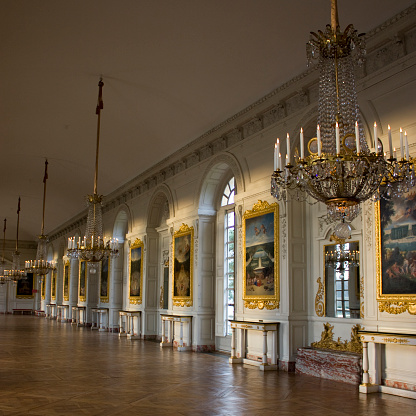 Paris, France - January 2, 2017: Interior hallway at the Palace of the Palace of Versailles in France. It was an official residence of the kings of France and is now a World Heritage Site.